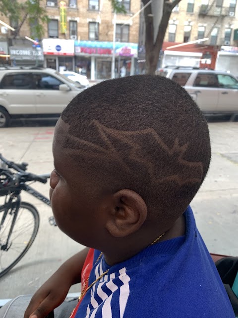 Real client haircut with design, from the shop's Google reviews